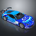 Blue Race Car With GAMET OIL Decals Rear Wing And Sporty Design