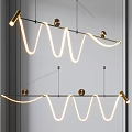 Modern Wave Shaped Pendant Lights With Gold Accents And Warm White Illumination
