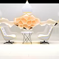 Contemporary Exhibition Booth Featuring Honeycomb Orange Decoration White Chairs With Yellow Trim And Small Table