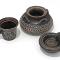 Three Black And Red Traditional Pottery Items With Intricate Patterns And Handles 3d model