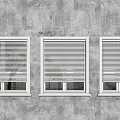 Modern Black Framed Windows on Gray Concrete Wall with Tree and Building Reflections