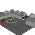 Modern L-shaped Sofa With Multiple Pillows And Round Coffee Table Set On Gray Rug 3d model