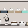 Modern Household Supplies Shelf With Colorful Tissue Boxes Decorative Cat Figurines And Soap Bars
