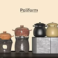 Stylish Poliform Kitchen Cookware With Colorful Ceramic Pots And Lids On Gray Cabinet