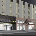 Modern Multi Story Hotel Building Exterior With Glass Doors Outdoor Seating And Trees At Night