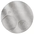 Gray Round Rug With Textured Circular Patterns And Modern Minimalist Design