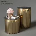 Modern Gold Cylindrical Dining Tables With Marble Tops Pink Roses Vase And Book