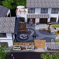 Traditional Chinese Garden Landscape With Circular Courtyard Gray Tile Roofs And Green Plants