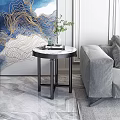 Elegant Side Table With Marble Top And Black Metal Legs Next To Gray Sofa