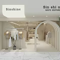 Modern Sinshine Haute Couture Clothing Store With Clothing Racks Marble Floor And Green Plants