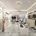 Stylish Clothing Store Interior With Chandelier Fan Racks Clothes White Display Tables And Marble Flooring