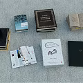 Various Colored Books Open Notebooks And Stacked Journals On Table Surface