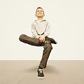 Man Wearing Gray Hoodie Dark Pants Striking Unique Pose Against White Background