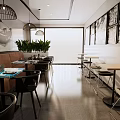 Modern Restaurant Interior With Tables Chairs Green Plants And Black White Decorative Paintings
