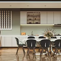 Modern Restaurant Dining Area With White Table Black Chairs Flower Arrangement And Wall Art