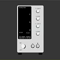 White Electronic Device With Digital Display Knobs Ventilation Slots And Warning Labels