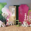 Elegant Floral Decor Featuring Pink Green Backdrops Calligraphy Lanterns and Pink White Blooms