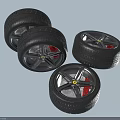 Set of Four Stylish Black Car Tires With Black Rims And Yellow Center Logos