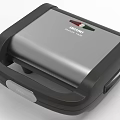Modern Kitchen Appliance Electric Sandwich Toaster with Silver Body and Black Accent Design