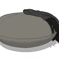 Modern Round Gray Ottoman with Black and White Striped Fringe Blanket