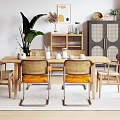 Modern Wooden Dining Table Set With Rattan Back Chairs Yellow Cushions And Potted Plant
