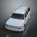 Chevrolet White SUV with Roof Rack Sleek Front and Reflective Surface