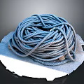 Blue Rope For Daily Life Supplies Coiled On White Circular Surface