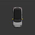 White Compact Car With Black Roof Yellow Side Mirrors And Black Wheels