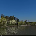 Modern Urban Lakeside Landscape Garden With Lush Greenery Winding Walkways And Clear Blue Waters