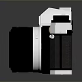 Vintage Electronic Camera With Silver And Black Design And Classic Lens