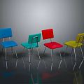 Colorful Blue Green Red And Yellow Chairs With Metal Legs And Floor Reflections
