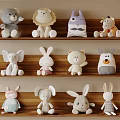 Decorative Plush Animal Ornament Set with Various Animal Designs on Wooden Shelf for Home Decor