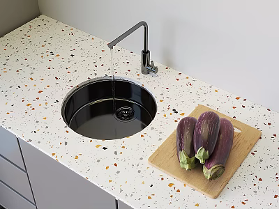Modern Kitchen Faucet Over Black Sink On Terrazzo Countertop With Eggplants On Cutting Board 3d model