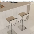 Modern Bar Stools With Beige Seats And Metal Frames Next To Light Colored Bar Counter