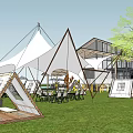 Garden Landscape Featuring White Tents Lawn Seating And Modern Building With Trees