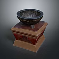 Textured Black Bowl Positioned On Decorative Wooden Base With Red Brown Details