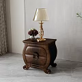 Classic Carved Bedside Table with Drawer Table Lamp Vase Curtains and Green Plant