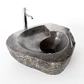 Natural Stone Washbasin With Organic Shape And Chrome Faucet In Modern Bathroom
