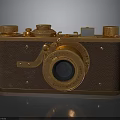 Vintage Classic Camera With Gold Metal Knobs Leather Body And Round Lens