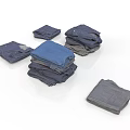 Neatly Folded Blue And Gray Clothes Stacked As Everyday Household Essentials