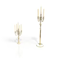 Elegant Golden Candelabras in Different Sizes with Candles on White Surface