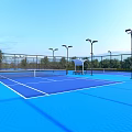 Blue Outdoor Basketball Court With Fence Streetlights And Green Trees Under Clear Sky