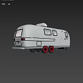 Shiny Silver Vintage Trailer With Shiny Exterior Red Wheels And Classic Design