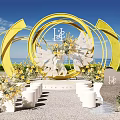 Beach Wedding Ceremony Setup With Yellow Circular Arches And Floral Decorations