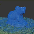 Koala Sculpture on Green Grass with Stone Base and Gray Orange Fur