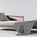 Stylish Modern Chaise Lounge With Checkered Pillows And Plaid Blanket