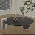 Round Black Minimalist Coffee Table With Fruit Bowl White Vase Green Plant In Light Room