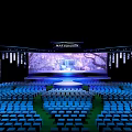 Spacious Conference Hall Interior With Stage Large Screen And Neatly Arranged Blue Seats