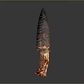 Ancient Textured Stone Spearhead Weapon with Sharp Pointed Blade and Wooden Handle Wrapped in Cord