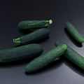 Fresh Vibrant Green Cucumbers and Zucchini Vegetables Arranged on Dark Background